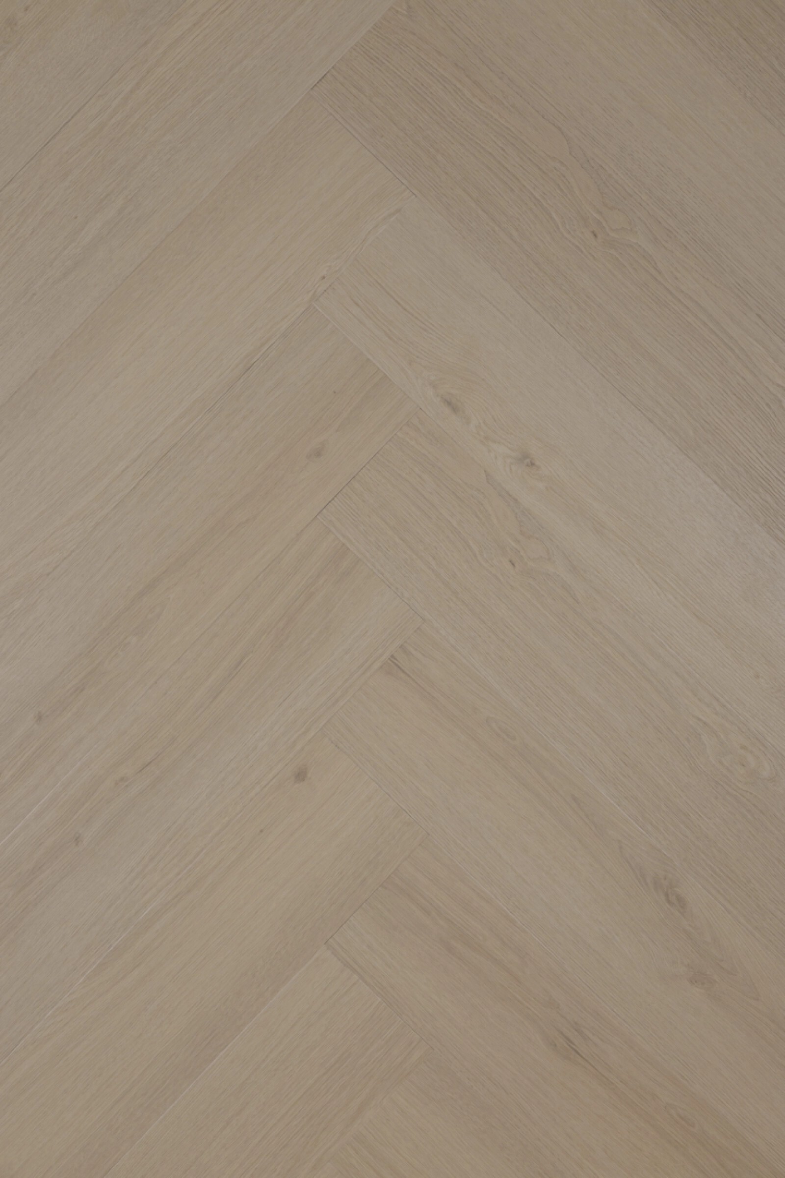 pavici-form-grand-herringbone-warm-oak-pvc-vloer